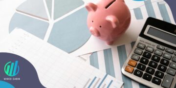 investing: investment spreadsheets, calculator and piggy bank