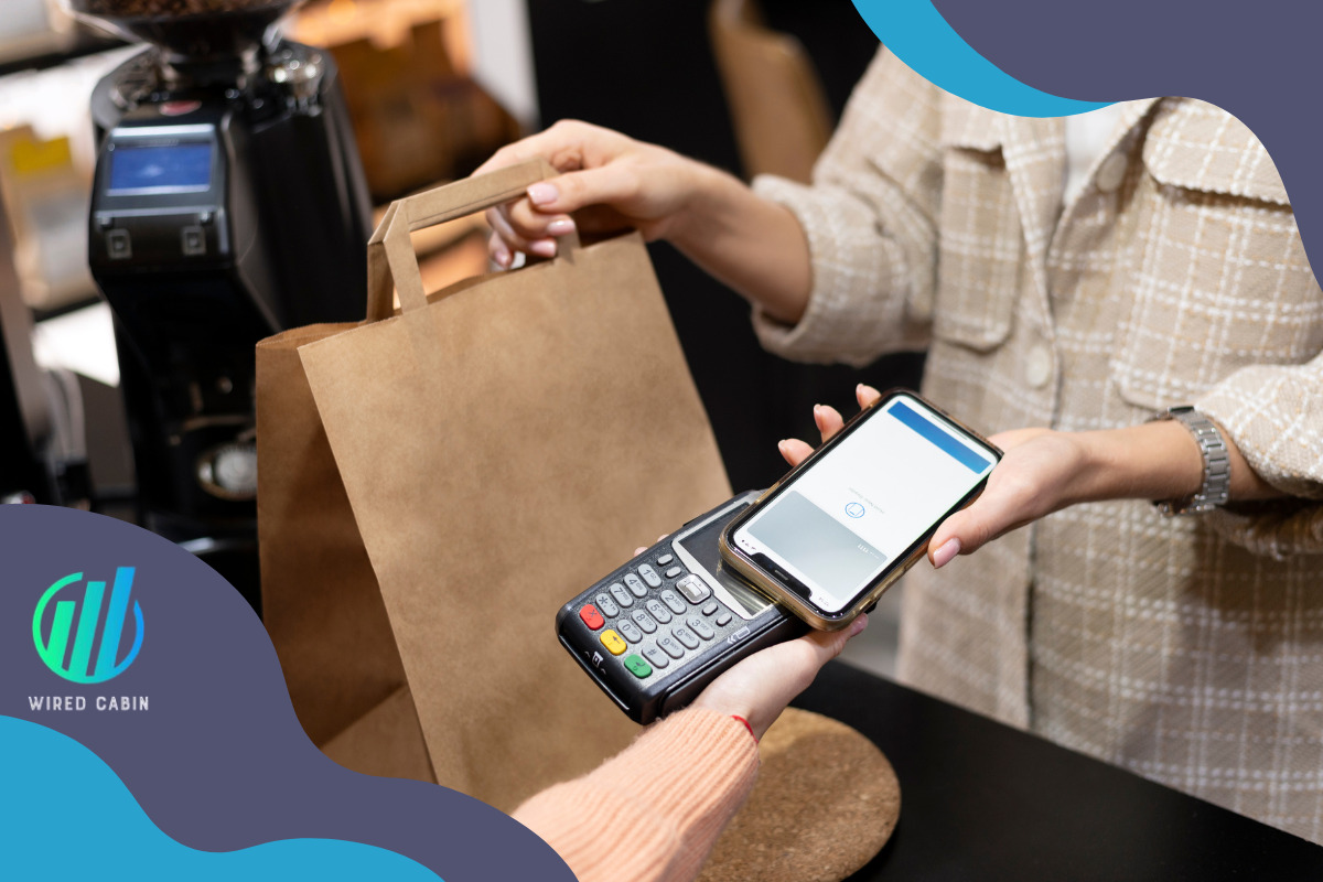 e-wallet: person paying with a digital wallet at a shopping terminal